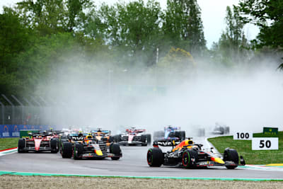 Max Verstappen leads Sergio Perez and the rest of the field into turn one at the start during the F1 Grand Prix of Emilia Romagna at Autodromo Enzo e Dino Ferrari on April 24, 2022.