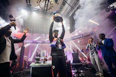 Benjamin ‘Problem X’ Simon raises the trophy in Las Vegas, Nevada on November 14, 2021 