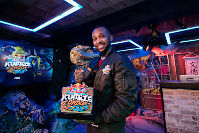 Mister Crimson lifts the trophy at the Red Bull Kumite event in London, UK on May 23, 2021  