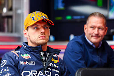 Ex-F1 driver Jos Verstappen looks at his son, the World Champion Max Verstappen of the Netherlands and Oracle Red Bull Racing.