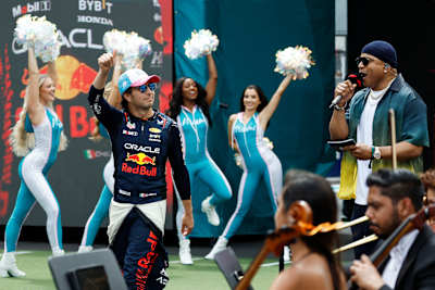 Sergio Perez of Mexico and Oracle Red Bull Racing walks out onto the grid prior to the F1 Grand Prix of Miami at Miami International Autodrome on May 07, 2023 in Miami, Florida