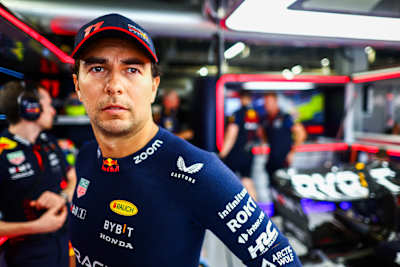 Sergio Perez of Mexico and Oracle Red Bull Racing walks to the grid prior to the F1 Grand Prix of Japan at Suzuka International Racing Course on September 24, 2023 in Suzuka, Japan.