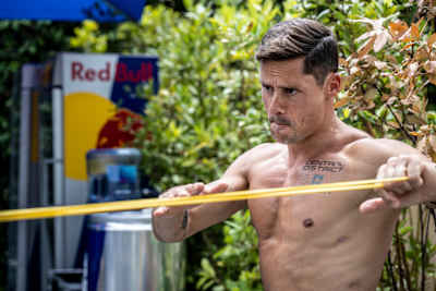 In 2024, Constantin Popovici warms up at Red Bull Cliff Diving event in Athens