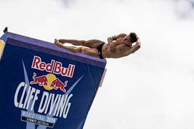 In 2024, Constantin Popovici dives from Red Bull Cliff Diving platform in Sydney