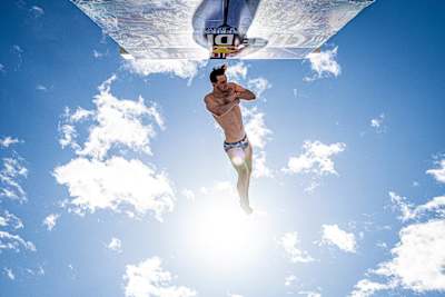 In 2024, Aidan Heslop dives from Oslo Opera House platform.