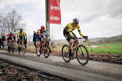 Wout Van Aert racing the 79th Omloop Het Nieuwsblad 2024 race from Ghent to Ninove over 202km on February 24 2024.