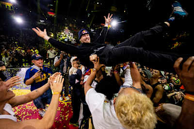B-boy Menno of the Netherlands is lifted aloft while celebrating his win during the Red Bull BC One World Final at Farmasi Arena, Rio de Janeiro, Brazil on December 7, 2024.