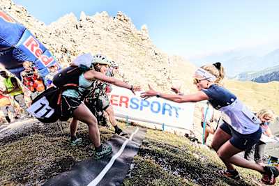 Johanna Hiemer and Elisabeth Kofler of Team Sport Auer 4 perform during the Red Bull Dolomitenmann in Lienz, Austria on September 9, 2023.