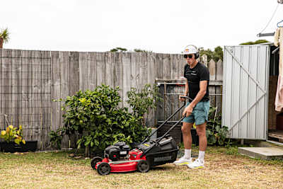 Hayden Wilde mows his parents lawn in Whakatane, NZ on December 19, 2023.