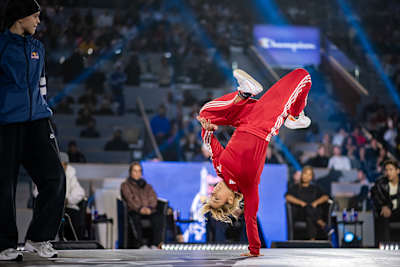 B-Girl Vanessa does an airfreeze at the Red Bull BC One World Final event in Paris