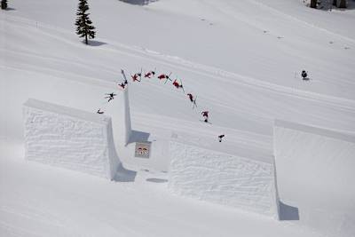 Simon Dumont achieves big air on the halfpipe.