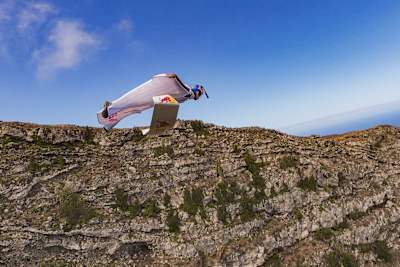 Peter Salzmann seen during the Red Bull Wingsuit Foil Project at El Hierro, Spain on September 3, 2025. Drone piloted by Ivan Merino, image processed by Sebastian Marko. 