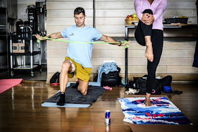 Constantin Popovici of Romania stretches at the athletes' area during the training day of the final stop of the Red Bull Cliff Diving World Series in Boston, USA, on September 18, 2025. 