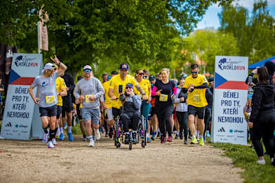 Runners, including Anna Slancová and Tomáš Slavík, launch into action at the Wings for Life World Run 2025 in Jablonec nad Nisou, Czech Republic, capturing the event's spirit of unity and adventure
