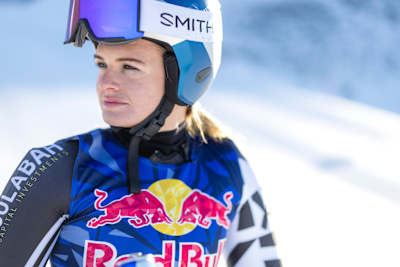 On August 4th, 2025, Alice Robinson sports her dynamic Red Bull racing suit while training at Coronet Peak near Queenstown, New Zealand, showcasing her alpine determination.