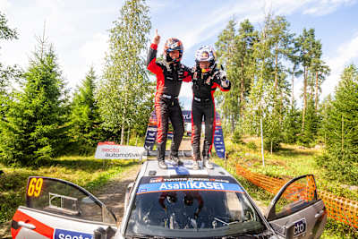 Kalle Rovanperä (FIN) Jonne Halttunen (FIN) Of Toyota Gazoo Racing Wrt celebrate on the podium in first place after winning the World Rally Championship in Jyvasküla, Finland on 3.08.2025