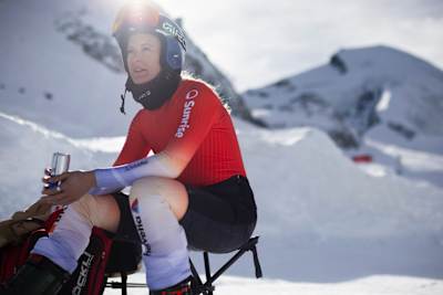 Fanny Smith takes a break during her training session in Saas-Fee, Switzerland on October 31, 2025, set against the iconic snowy Alpine backdrop.