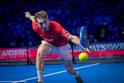Jon Sanz lunges for a dynamic shot during the Premier Padel 2024 Finals in Barcelona, Spain on December 22, 2024