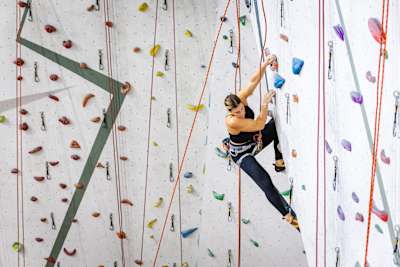 In 2023, Laura Horváth climbs an indoor rock wall during the MAG47 Wall Climbing event in Budapest, Hungary.