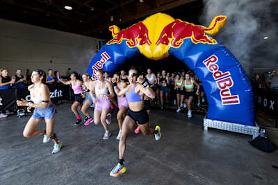 HYROX comepetitors start into the race under a Red Bull arch at a race in Auckland, New Zealand