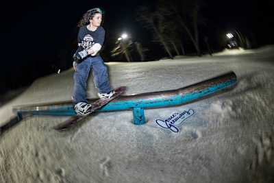 Egan Whit executes a rail ride at Grace's Getaway in Pine Knob Ski Resort, Michigan, USA on February 28, 2024.