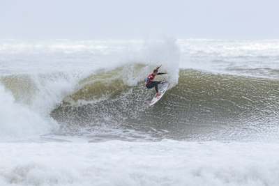 Caroline Marks showcases her incredible surfing skills at the MEO Rip Curl Pro Portugal 2025, riding a wave during the final at Supertubos, Peniche, Portugal.