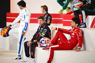 Carlos Sainz, Max Verstappen and Charles Leclerc look on during the drivers photocall prior to F1 Testing at Bahrain International Circuit on February 26, 2025 in Bahrain, Bahrain. 