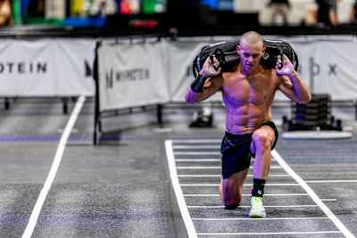 James Kelly at the lunges station, powering through the Hyrox Major Elite 15 competition in Hong Kong