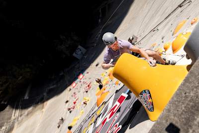 Jakob Schubert of Austria climbs the 180m multi-pitch man made route at the Verzasca Dam during the final of Red Bull Dual Ascent in Verzasca, Switzerland on November 2, 2024.