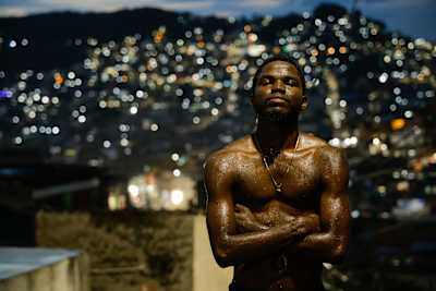 Andrezinho DB poses for a portrait at Vila Cruzeiro in Rio de Janeiro, Brazil on March 21, 2024.