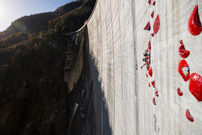 Jessica Pilz of Austria climbs the 180m multi-pitch man made route at the Verzasca Dam during the final of Red Bull Dual Ascent in Verzasca, Switzerland on November 2, 2024.