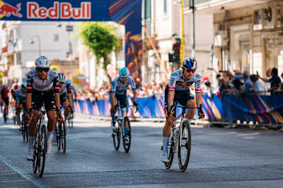 High-energy cycling action captured at the Red Bull KM during stage 4 of the 2025 Giro d’Italia race from Alberobello to Lecce in sunny Italy, showcasing the riders' determination and pace
