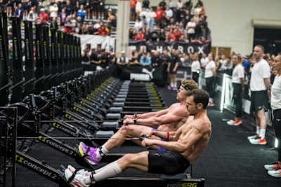 Tim Wenisch and Hunter McIntyre compete fiercely on rowing machines during the Men’s Elite 15 at Hyrox Chicago, USA.