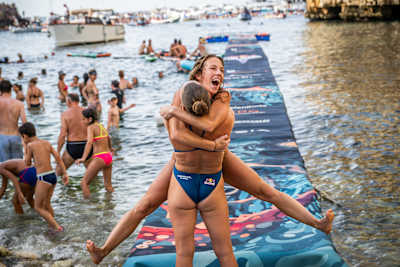 Kaylea Arnett celebrates with Ellie Smart after a stunning podium finish in Polignano