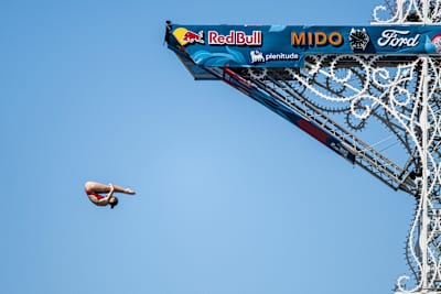 Canadian diver Simone Leathead performs a stunning dive from the 21-metre platform at the Red Bull Cliff Diving World Series in Polignano a Mare, Italy, during the 2025 competition