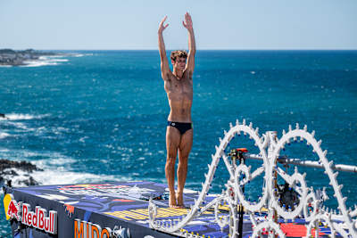 Andrea Barnaba of Italy stands poised on the 27-metre platform above the Adriatic during the thrilling final day of Red Bull Cliff Diving World Series 2025 in Polignano a Mare, Italy