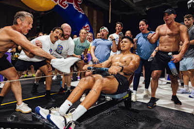 Man rowing in front of team-mates at Red Bull Gym Clash 