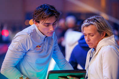 Armand Mondo Duplantis engages with staff backstage during Red Bull Mondo Classic 2025 in Uppsala, Sweden, showcasing dynamic energy at this elite pole vault event.