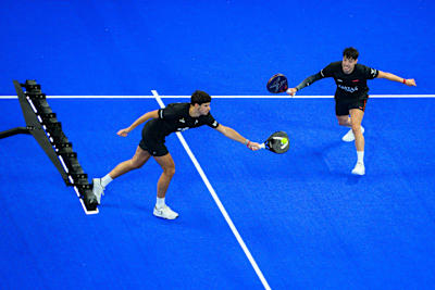 Arturo Coello of Spain and Agustin Tapia of Argentina in action during the Alpine Paris Major Premier Padel semi-final match held at the Roland Garros Stadium in Paris, France, on September 13, 2025. 