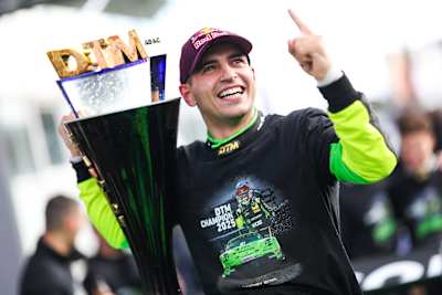 Ayhancan Güven lifts the DTM Champion 2025 trophy at the Hockenheimring, Germany, showing off Red Bull’s bold racing spirit during Stop 8 of the season