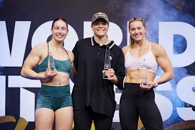 1st place - Laura Horvath, 2nd place - Aimee Cringle and 3rd place - Emma Lawson pose for a photo on the podium at the World Fitness Project Finals 2025 in Copenhagen, Denmark on December 21, 2025. 