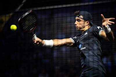 Alejandro Galán of Spain strikes a powerful forehand during the 2026 London Premier Padel P1 semifinal at Olympia London, Great Britain, on 8 August 2026.