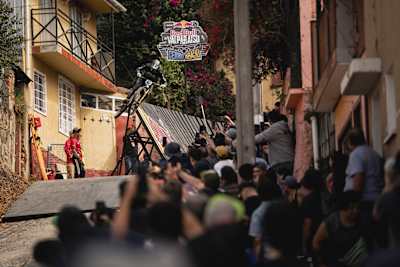 Alex Rudeau launches off a ramp during the Red Bull Cerro Abajo 2025 event in Valparaiso, Chile. 