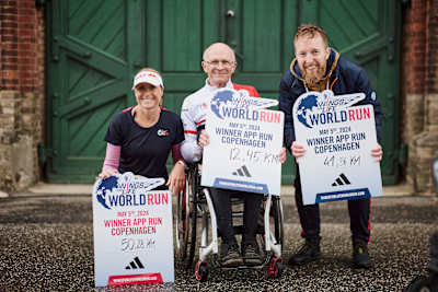 Camilla Pedersen, Gerhard Korbo and Peter Bang celebrate their wins at the Wings For Life World Run App Run in Denmark in 2024.