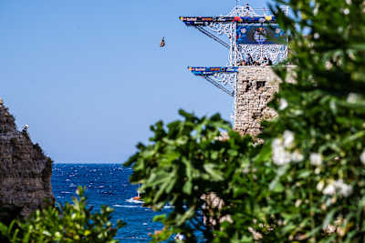 On 28 June 2025, Andrea Barnaba of Italy performs a dramatic dive from the 27 metre platform during the Red Bull Cliff Diving World Series second stop in Polignano a Mare, Italy