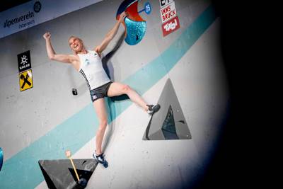 Janja Garnbret celebrates completing a challenging problem at the IFSC Climbing World Cup in Innsbruck, Austria, in June 2025.