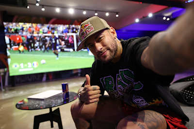 Neymar Jr gives is pictured relaxing at home in Santos, Brazil. 