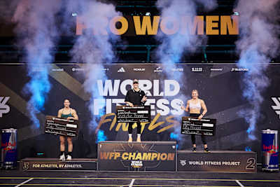 Laura Horváth, Aimee Cringle and Emma Lawson pose for a photo on the podium at the World Fitness Project Finals 2025 in Copenagen, Denmark on December 21, 2025.