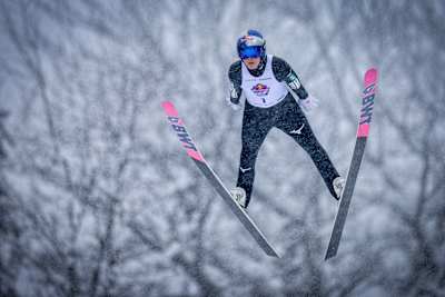 Ryōyū Kobayashi soars at Red Bull Target Jumping, Zakopane 2026 in Zakopane, Poland, showcasing his ski jumping prowess amid snowy conditions.