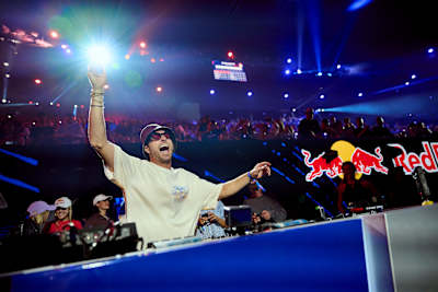 In 2026, Fisher enjoys a hands-in-the-air moment at Red Bull BassLine in Melbourne, Australia.